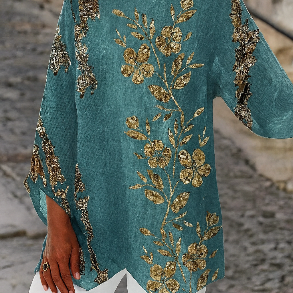 Gylden blomsterbluse med lange ærmer