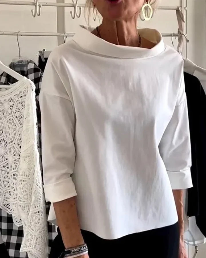 Casual top med brede revers og halv rullekrave for et stilfuldt look