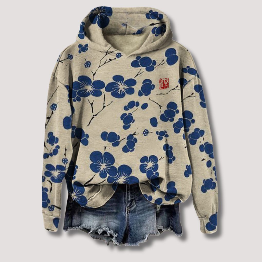 Let sweater med blomsterprint og hætte
