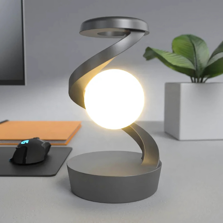 Moderne spiralbordlampe med varmt lys