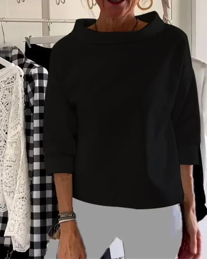 Casual top med brede revers og halv rullekrave for et stilfuldt look
