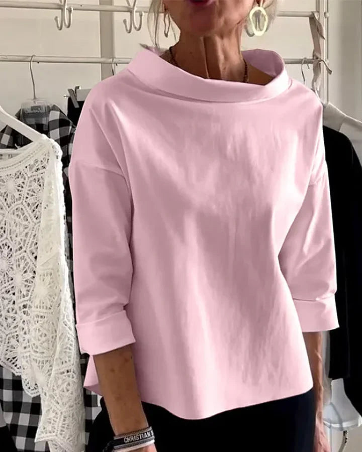 Casual top med brede revers og halv rullekrave for et stilfuldt look