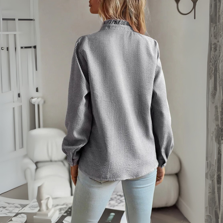Elegant langærmet bluse
