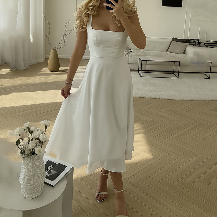 Elegant ærmeløs ensfarvet damekjole