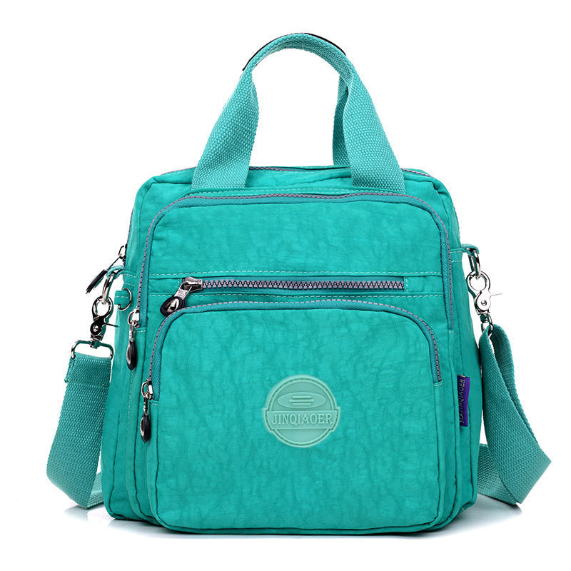 Vandtæt multifunktionel crossbody-taske – Alsidig elegance til hverdagsbrug