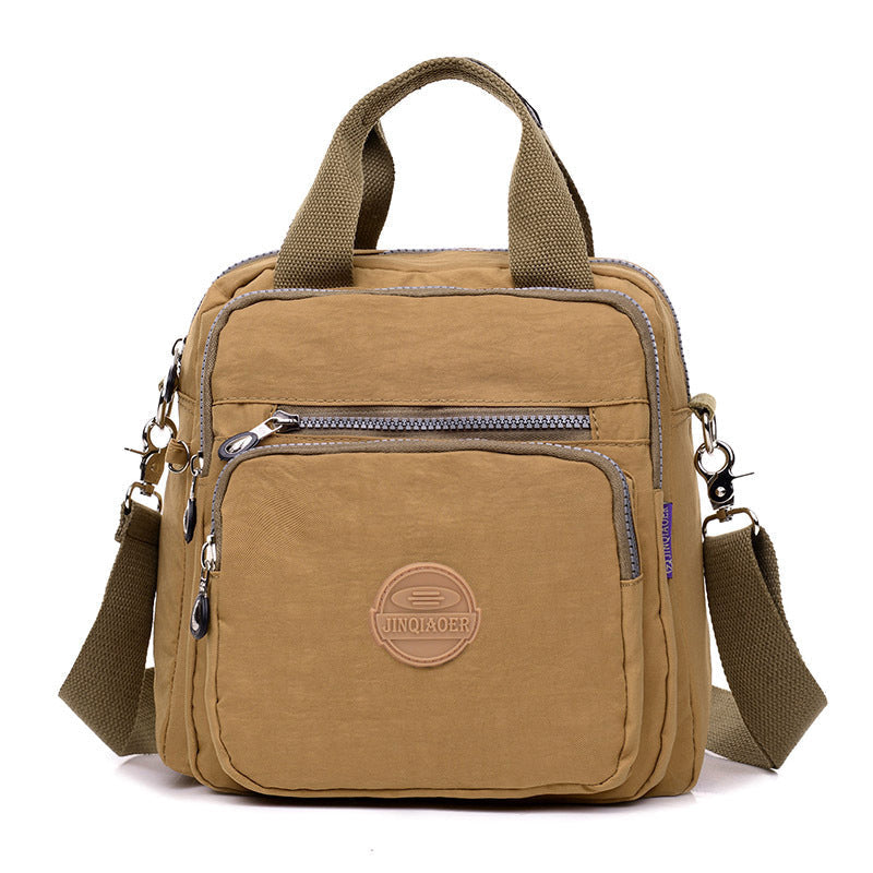 Vandtæt multifunktionel crossbody-taske – Alsidig elegance til hverdagsbrug