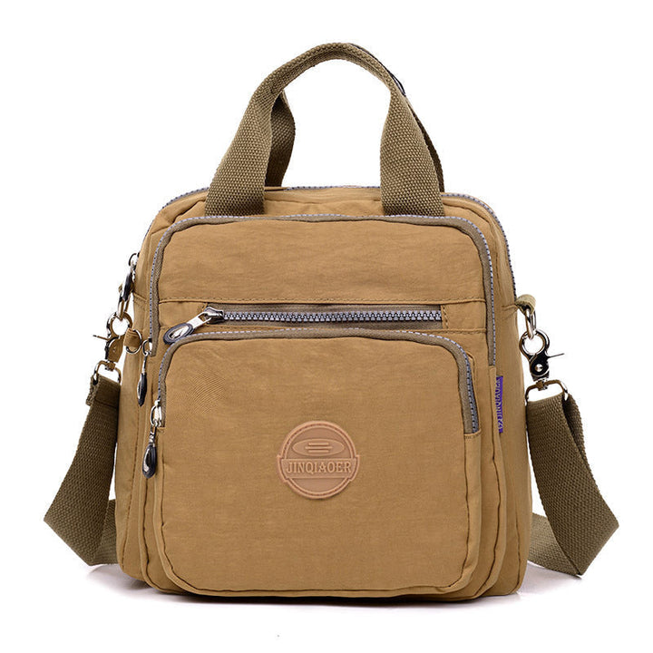 Vandtæt multifunktionel crossbody-taske – Alsidig elegance til hverdagsbrug