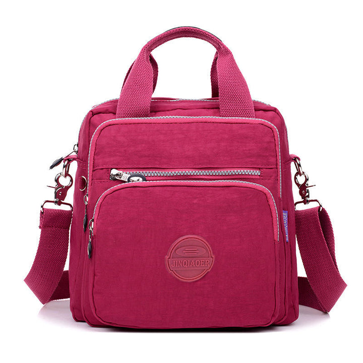 Vandtæt multifunktionel crossbody-taske – Alsidig elegance til hverdagsbrug