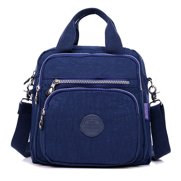 Vandtæt multifunktionel crossbody-taske – Alsidig elegance til hverdagsbrug