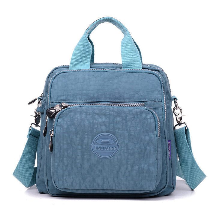 Vandtæt multifunktionel crossbody-taske – Alsidig elegance til hverdagsbrug