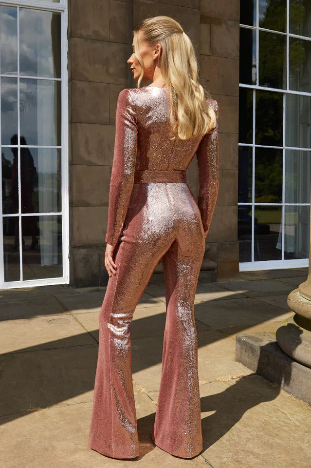 Pailletjumpsuit med korsetdetaljer og vidde ben