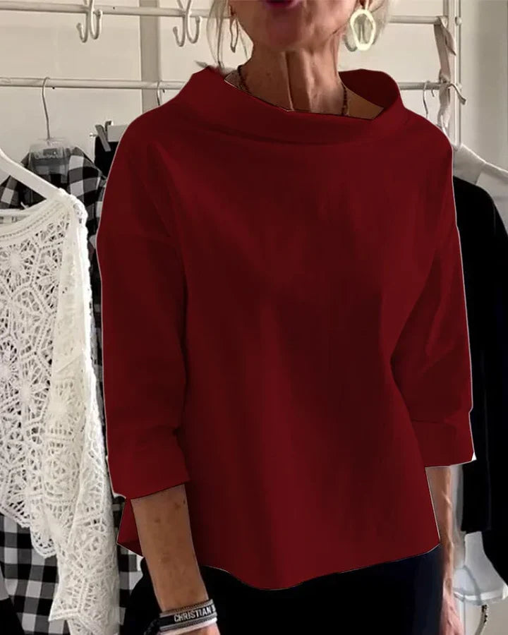 Casual top med brede revers og halv rullekrave for et stilfuldt look