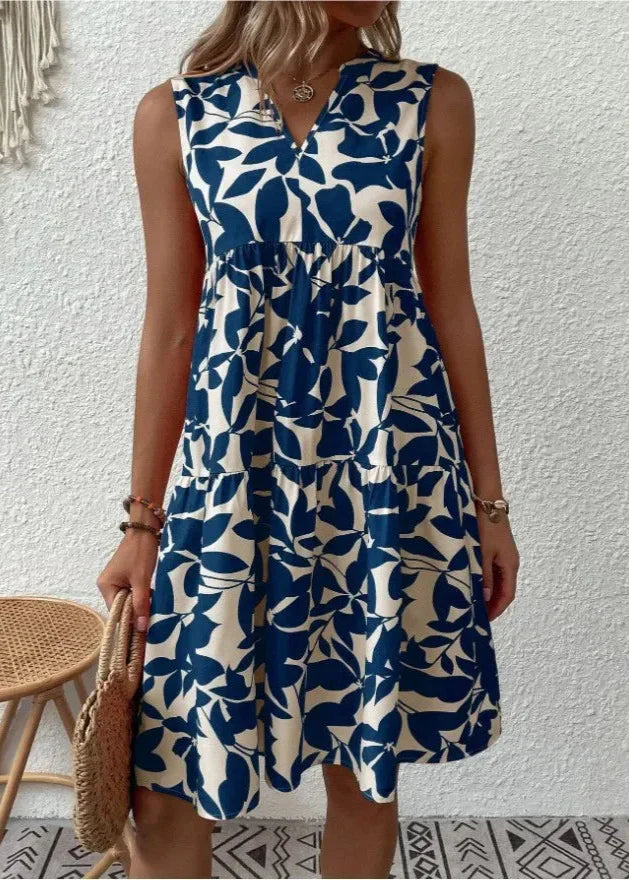 Elegant sommerkjole med V-hals og feminin silhuet