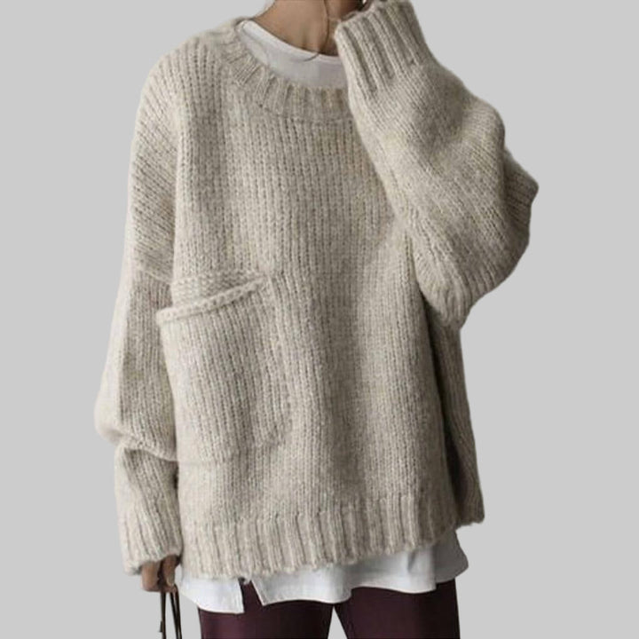 Overdimensioneret elfenbensfarvet sweater med lomme foran