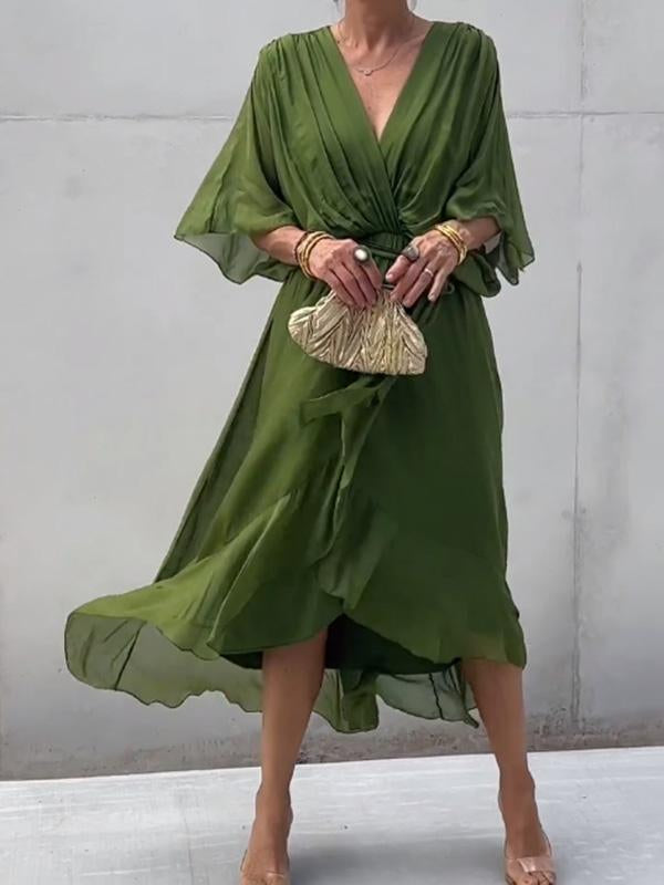 Elegant kjole med V-hals